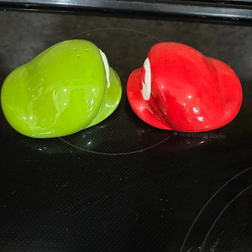 The Super Mario Bros. Salt & pepper shakers Mario & Luigi Hats set by Geek Fuel.